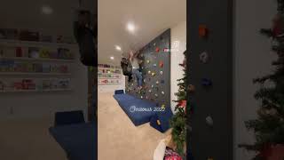 Monkey bars over rock wall, indoor Christmas surprise