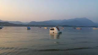 strange boat, it looks like an amphibious caravan.. lake Garda