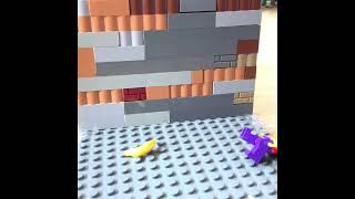 Lego man slips over a banana peel