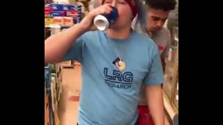 2 men play beer pong inside store and trash it