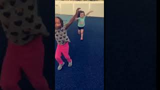 little girl runs into wall