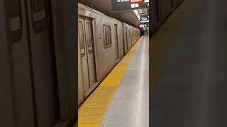 TTC Bombardier Toronto Rocket #6052 pulling away from Osgoode