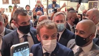 French President Emmanuel Macron hit by egg thrown from crowd in Lyon