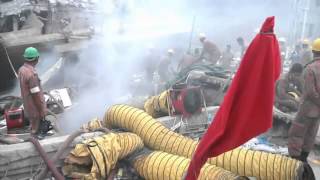 Rescue workers in Bangladesh search Rana Plaze rubble