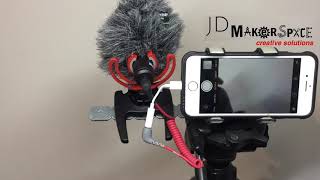 Vlogging setup with Rode Microphone and an iPhone on my tripod.