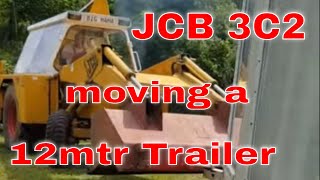 JCB 3C2 old timer moving a 12mtr trailer