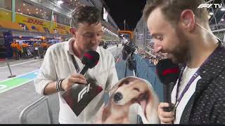 Will Buxton gets handed a pillow of Leo Leclerc by a fan to deliver it to Charles | Singapore GP 24