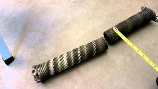 Broken Garage Door Spring Repair - 1 of 3 ( DIY fix springs snap howto replace)