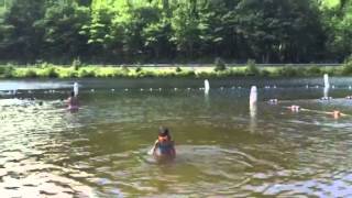 Lily swimming under water