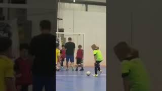 Yikes! Kid takes futsal ball in the face