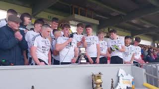 Conor Rynne and Seanie McMahon accept the cup on behalf of Ennistymon.