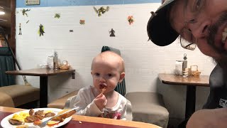 Watching my 18month old granddaughter eat breakfast at Mann’s grille Indy