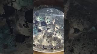 chemical reaction over a bed of marbles