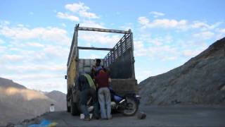 lifting a bike to a truck.mkv