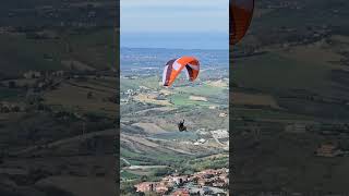 Paragliding flyby San Marino Monte Titano