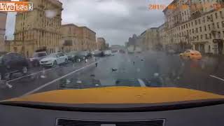 Russian Driver Crashes Into Police Car In The Rain