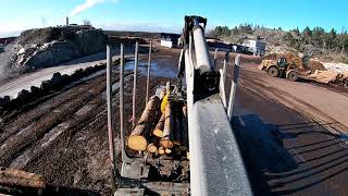 Unloading a load of timber on a timbertruck #17