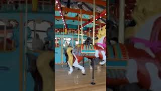 Riding an oceanfront Carousel