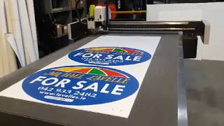 Michael Lavelle Signage on Konsberg Cutting Machine