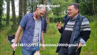 Baptism of brave Scottish man in cold water, River Clyde, Lanark Scotland.