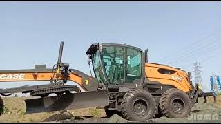 CASE 845C MOTOR GRADER UNLOADING....