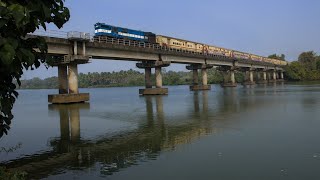 The 12133 Mumbai Express chugging over River Swarna with Kalyan WDM3D ALCO!