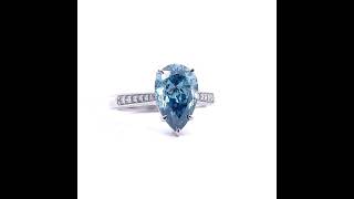 4.10 Carat Fancy Blue Diamond Pear Solitaire & Pavé White Diamond Ring in 14k White Gold