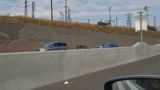 Pursuit suspects drive wrong way on 215 freeway in California and bail out