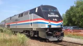 Early Amtrak paint scheme seen in Saco, ME