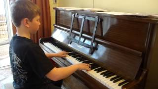 Tosha plays 'Comptine' on piano