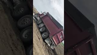 Dump truck stuck deep in the mud!!!!