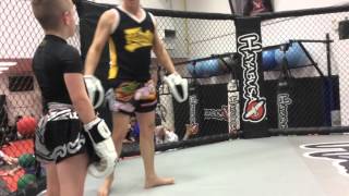 Samuel Loof 9 yrs old more Muay Thai training on pad work.