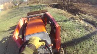 Kuboat Tractor with pallet forks make sawmilling easier video