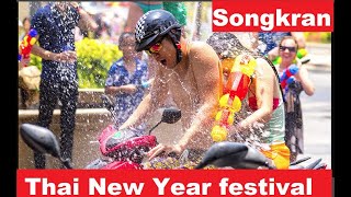 Thailand New Year Water Festival" Songkran is a traditional  where people use water guns and buckets