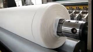 Jumbo roll toilet paper slitting and rewinding machine