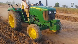 Johndeere 5105 4wd 3 plough working in field