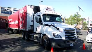 CANADA'S FAVORITE COFFEE transported by these TIM HORTON'S TRUCKS, Kelowna, BC, Canada