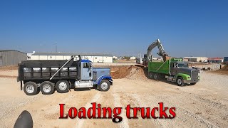 Loading Trucks And Placing Rip Rap