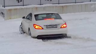 Mercedes CLS stuck in snow