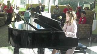 8 year old Angeline sings and plays Beautiful