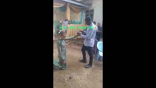 African women kneeling to receive engagement ring