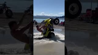 Epic atv water wheelie.