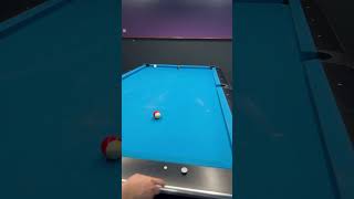 Flying over another object ball carom trick shot