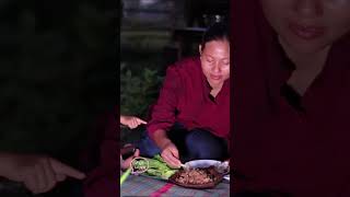 A countryside girl is preparing fish to fry #fried #food #cooking