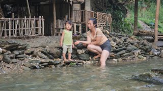 Girl builds stone wall to prevent floods - single mother