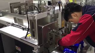 Semi automatic facial tissue paper packing machine