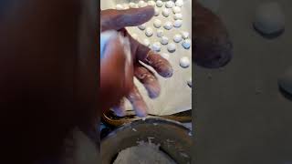 Making bilo bilo (Glutinous rice balls)